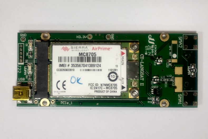 Green_converter_card_with_Sierra_MC8705_modem_module_in_slot.jpg