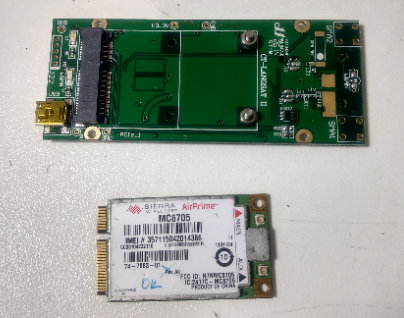 Green converter card and Sierra MC8705 modem module next to it.jpg
