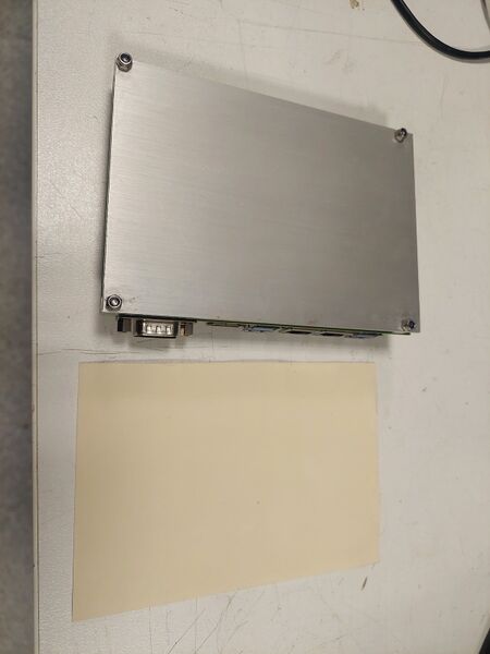 File:DFNEXT replacement PC with bare heatspreader and thermal adhesive.jpg